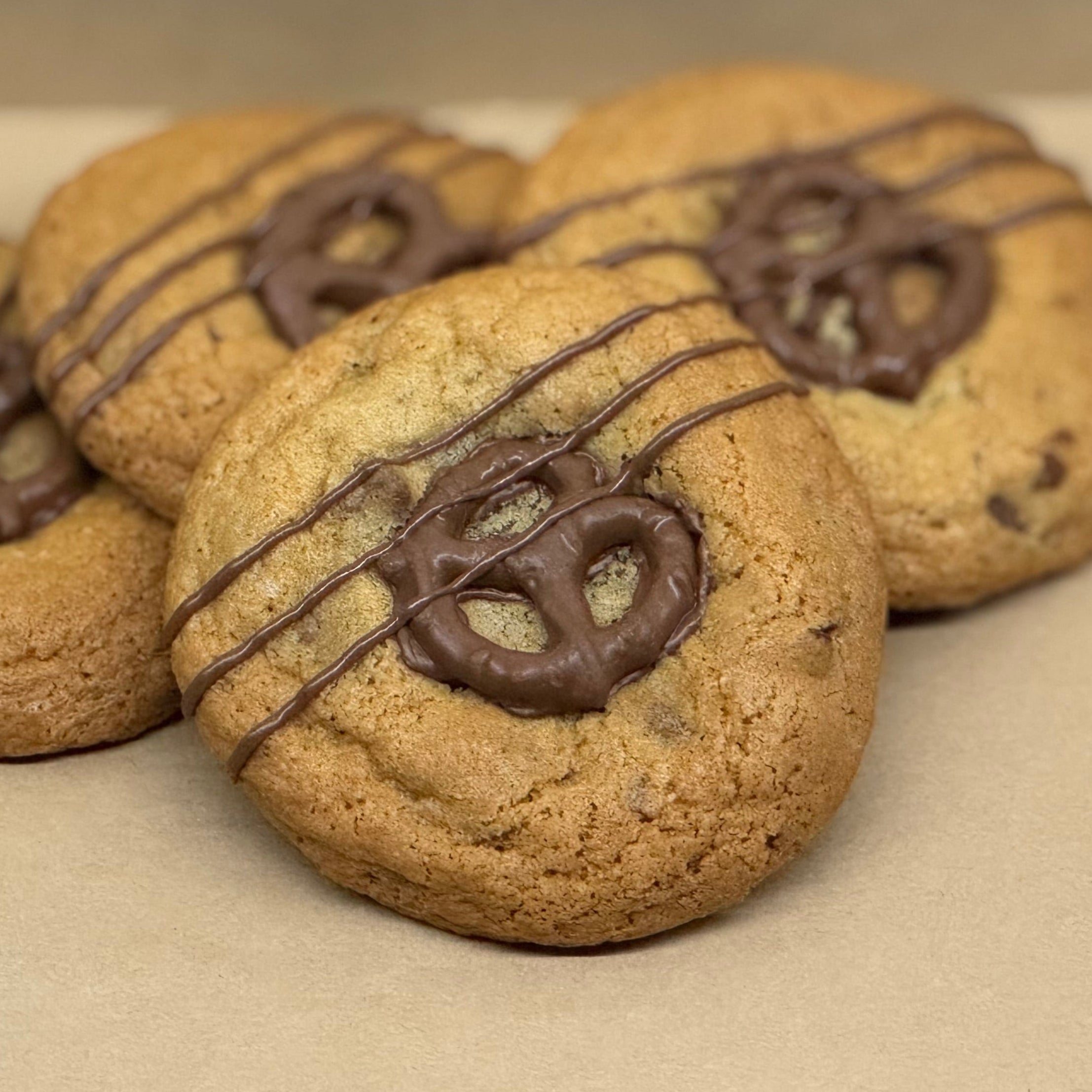 Cookies with chocolate pretzel and drizzle on top.