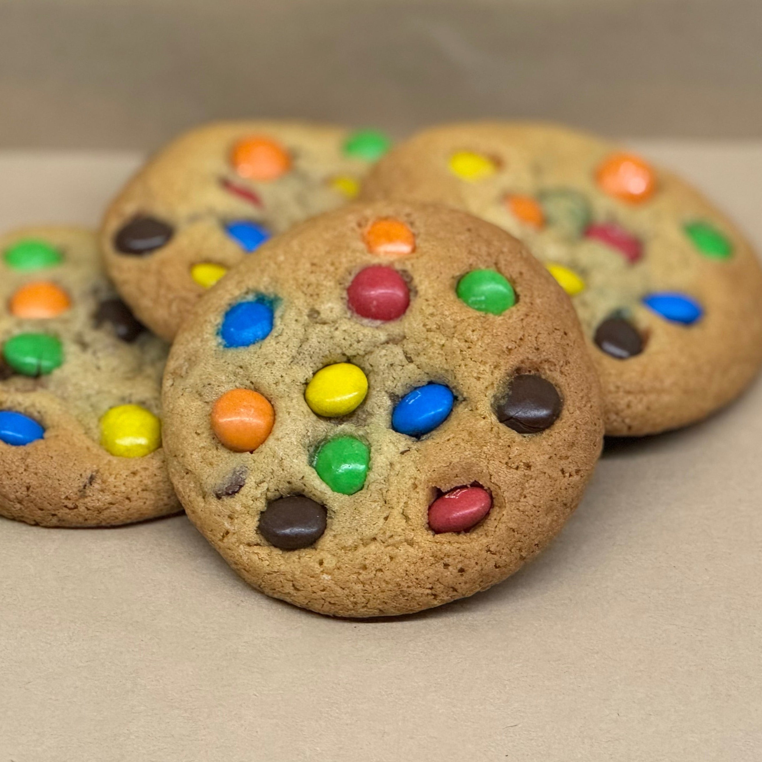 Cookies with colourful M&M's on a top.